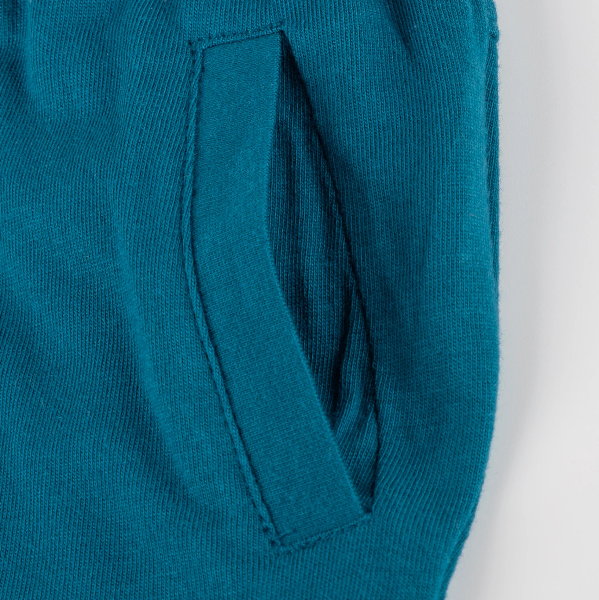 Baby Bermudas mit Aufschlag Fahrzeuge, blaugrün