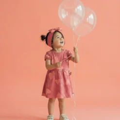 Baby Kleid mit Herzchen Print, rosarot