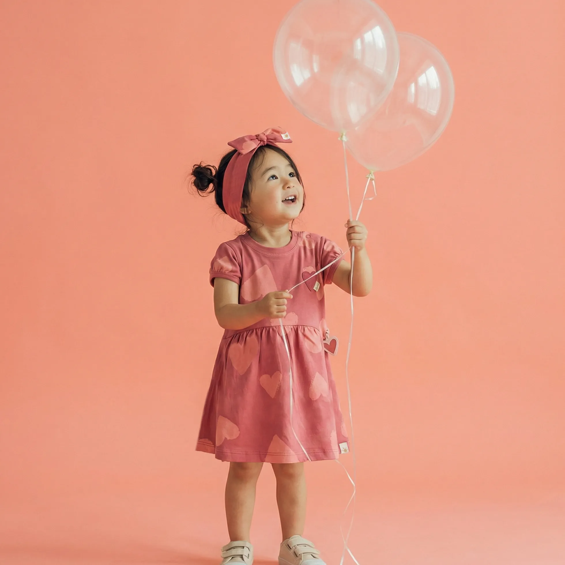 Baby Kleid mit Herzchen Print, rosarot