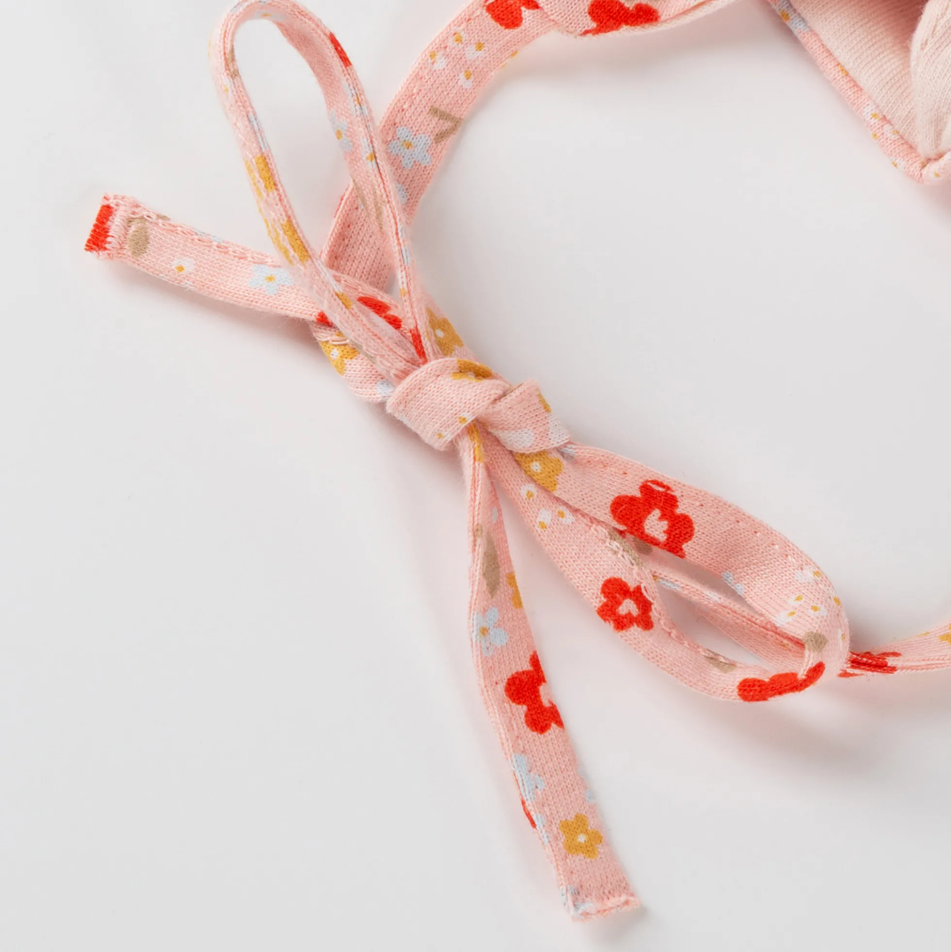 Baby Mütze Blümchen Print, rosa