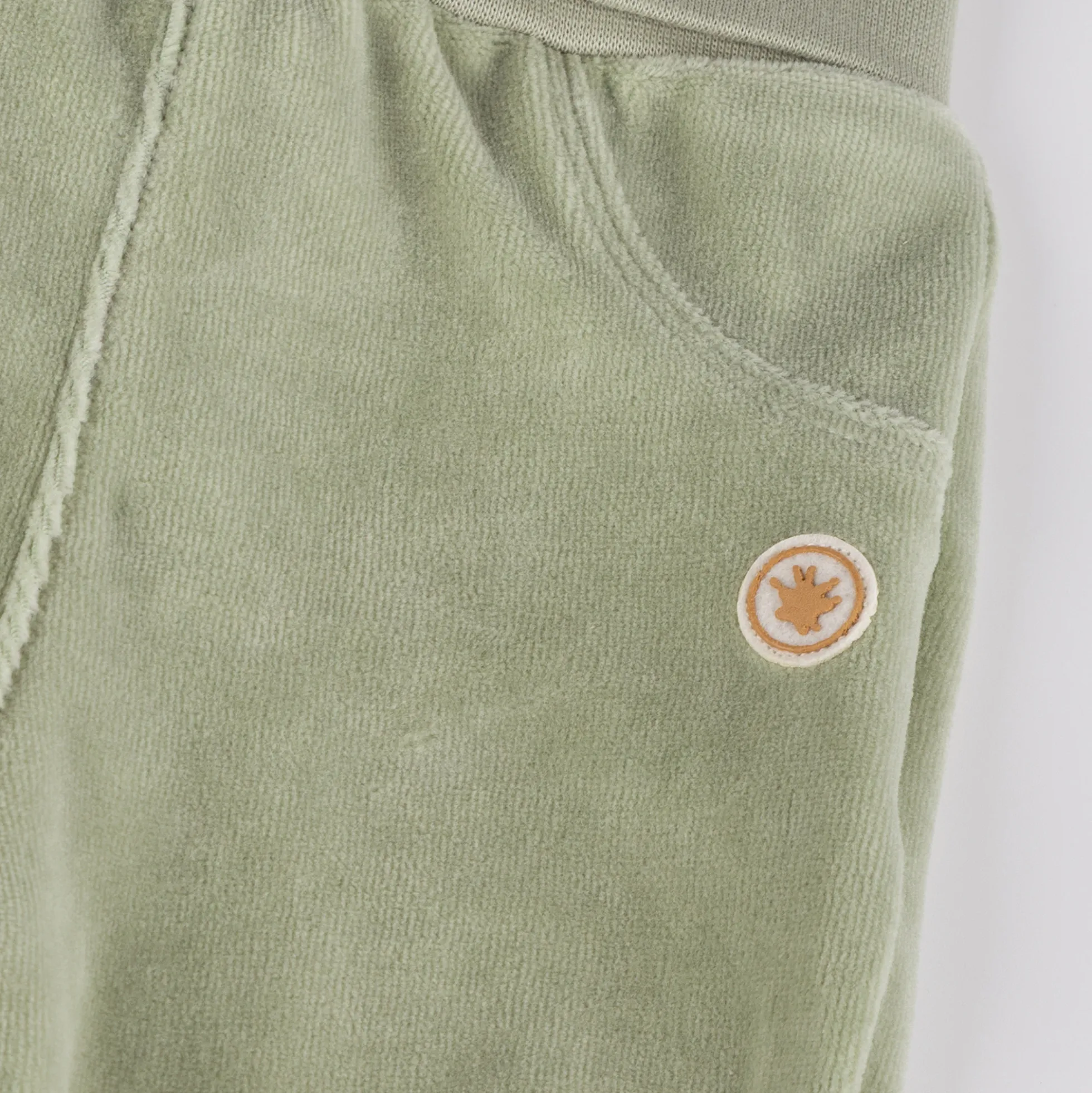 Baby Nickihose mit Füßchen, grün