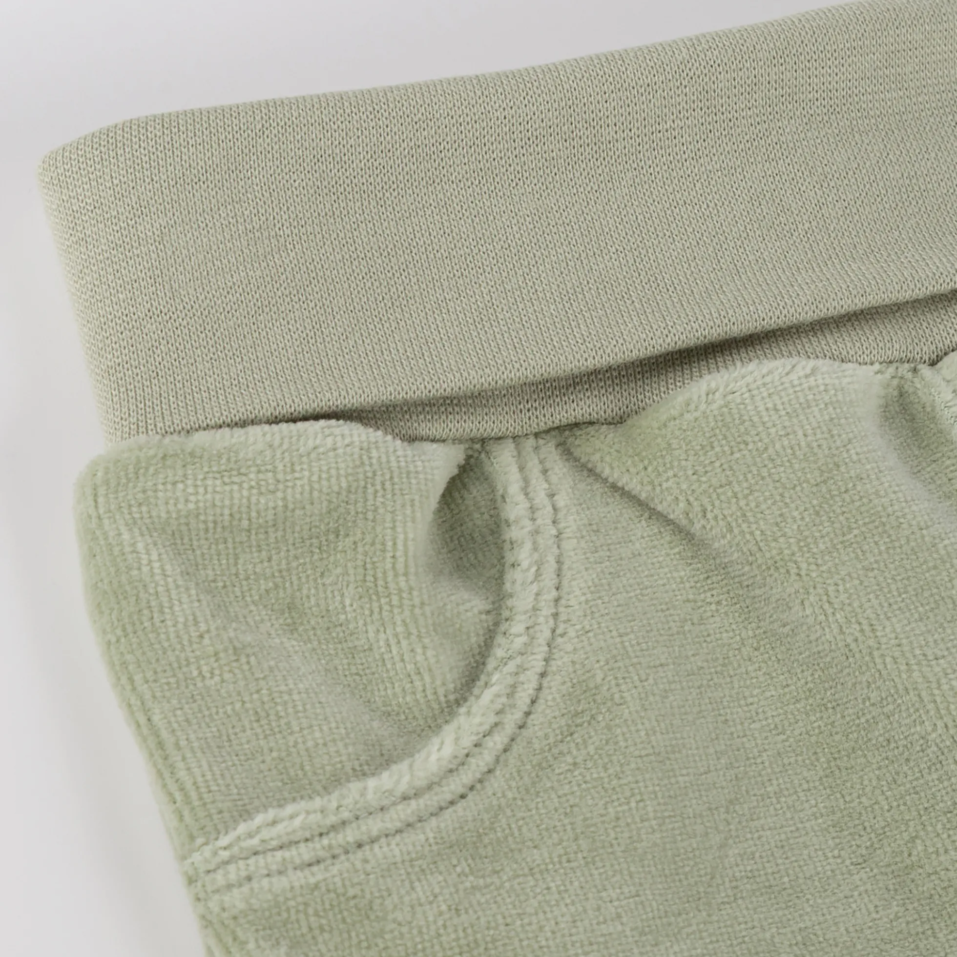Baby Nickihose mit Füßchen, grün