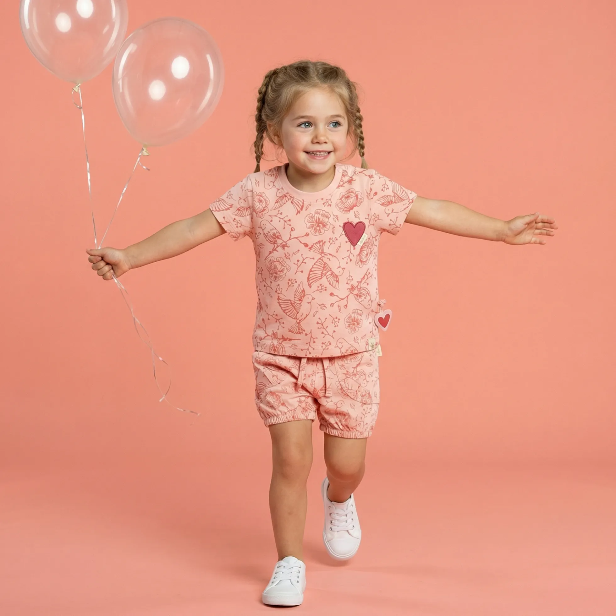 Baby Shorts mit Vögelchen Print, rosa